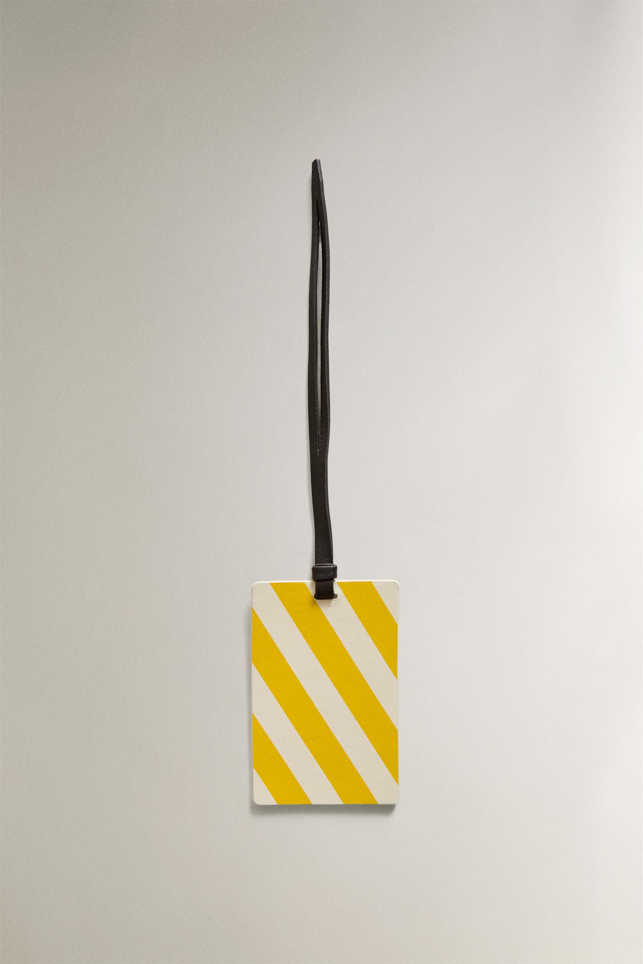 ÉTIQUETTE BAGAGE CUIR